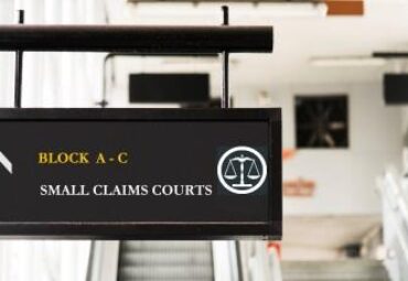 Hanging sign mockup in front of an escalator